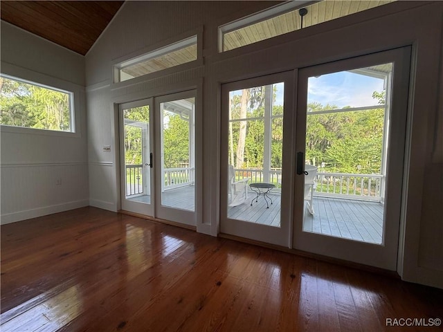 5217 Riverside Dr, Yankeetown, FL 34498 - entryway featuring hardwood / wood-style flooring, lofted ceiling, and french doors