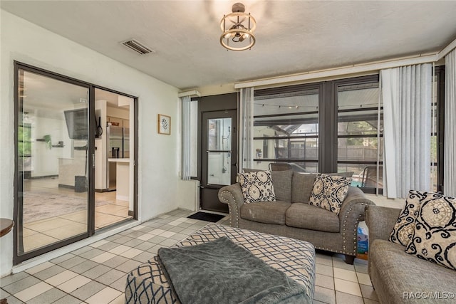 living room featuring light tile patterned floors