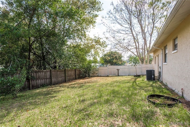 view of yard featuring central AC unit