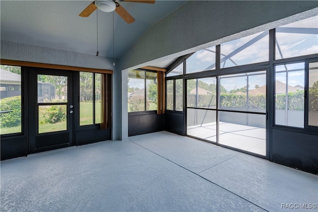 unfurnished sunroom featuring vaulted ceiling and ceiling fan