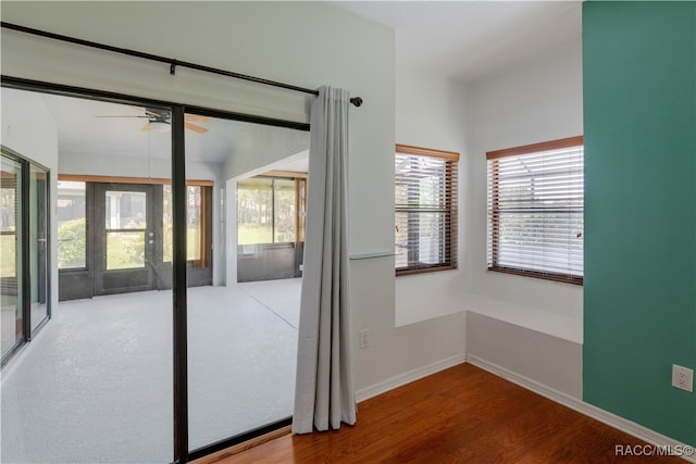 entryway featuring hardwood / wood-style floors and ceiling fan