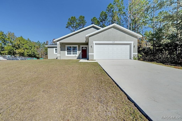 ranch-style home featuring a garage and a front yard