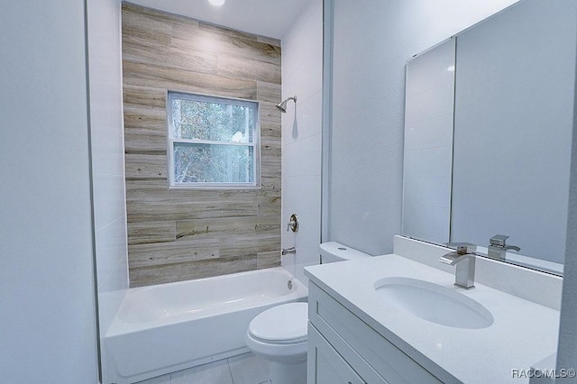 full bathroom with tile patterned floors, vanity, toilet, and tiled shower / bath