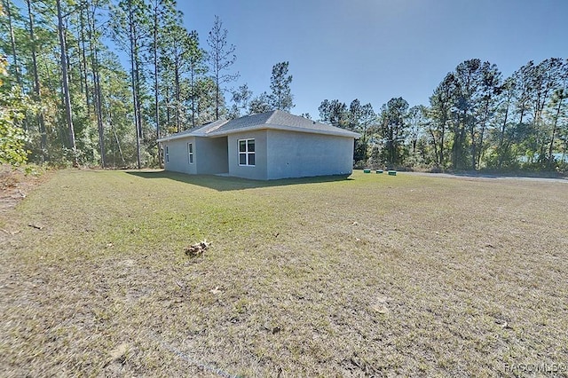 exterior space featuring a yard