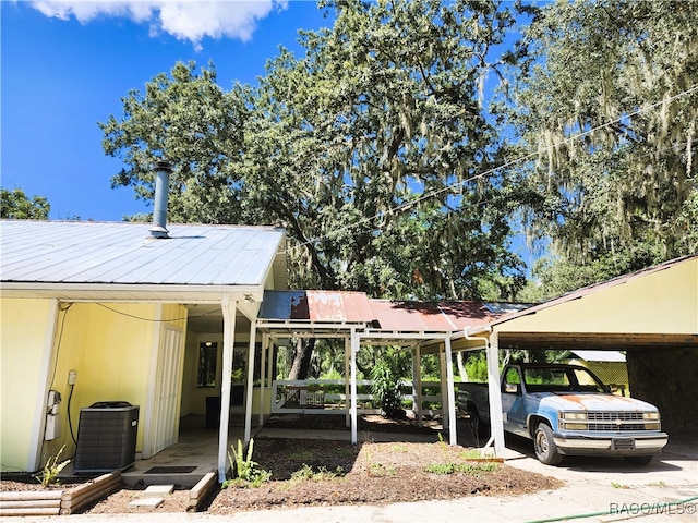 view of parking featuring a carport