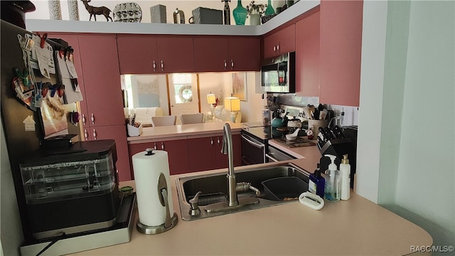 kitchen featuring sink and stainless steel appliances