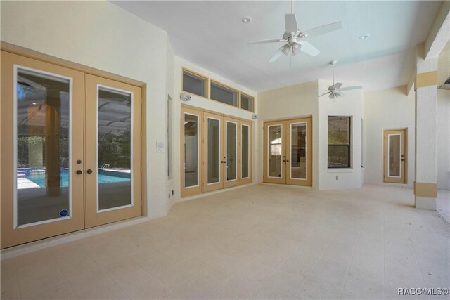 5550 W Yearling Dr, Beverly Hills, FL 34465 - unfurnished sunroom featuring french doors
