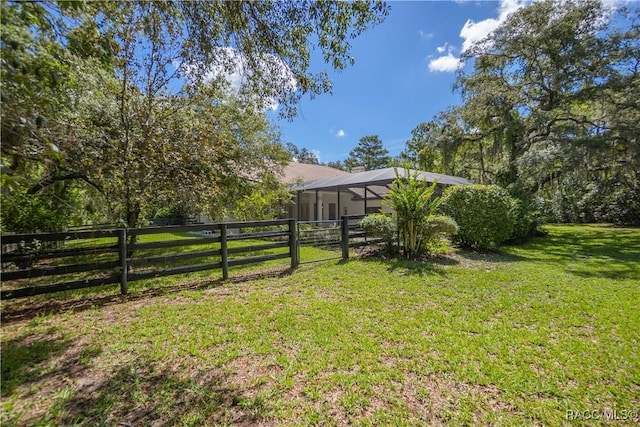 5550 W Yearling Dr, Beverly Hills, FL 34465 - view of yard featuring glass enclosure