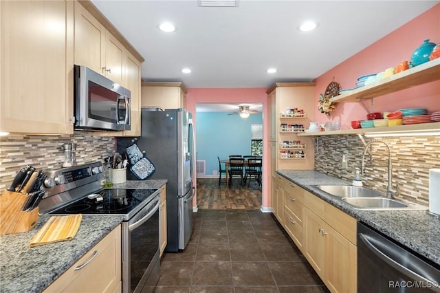 927 Cedar Ave, Inverness, FL 34452 - kitchen featuring appliances with stainless steel finishes, a sink, light brown cabinetry, backsplash, and recessed lighting