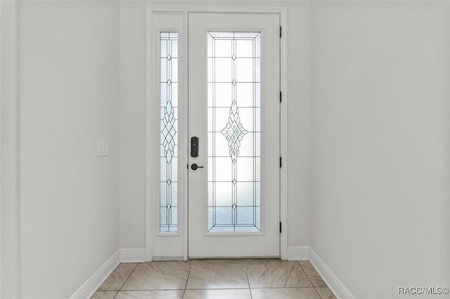 interior space featuring light tile patterned flooring