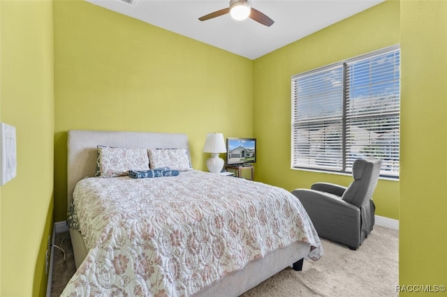 bedroom featuring ceiling fan and carpet floors