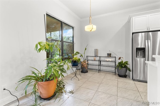 interior space featuring light tile patterned floors and crown molding