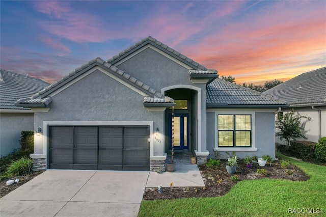 view of front of home with a garage