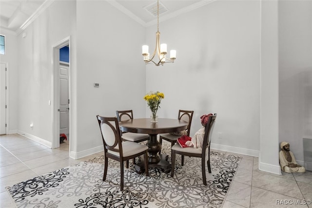 dining space with ornamental molding, light tile patterned floors, and an inviting chandelier