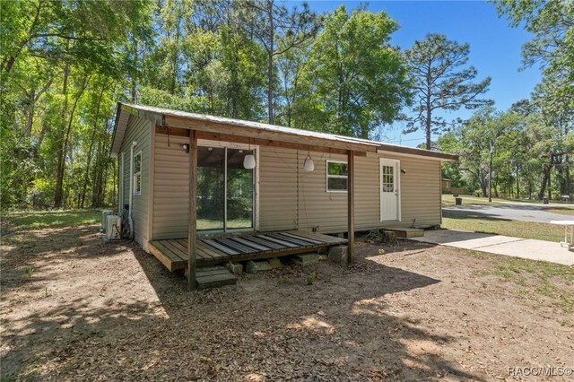 spare room with dark hardwood / wood-style floors and ceiling fan