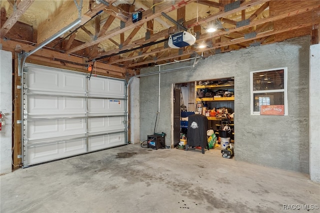 garage featuring a garage door opener