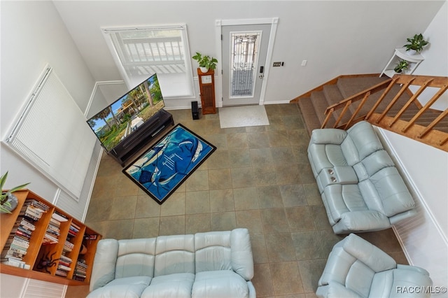 living room with tile patterned flooring