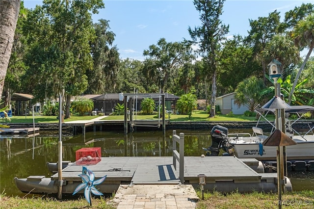 dock area featuring a water view