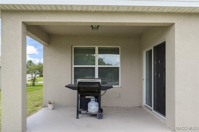 3417 N Michener Pt Unit 2C, Beverly Hills, FL 34465 - view of patio / terrace featuring area for grilling