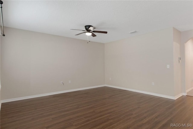 3417 N Michener Pt Unit 2C, Beverly Hills, FL 34465 - empty room featuring ceiling fan and dark wood-style flooring