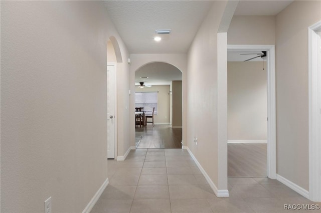 3417 N Michener Pt Unit 2C, Beverly Hills, FL 34465 - hall featuring arched walkways and light tile patterned floors