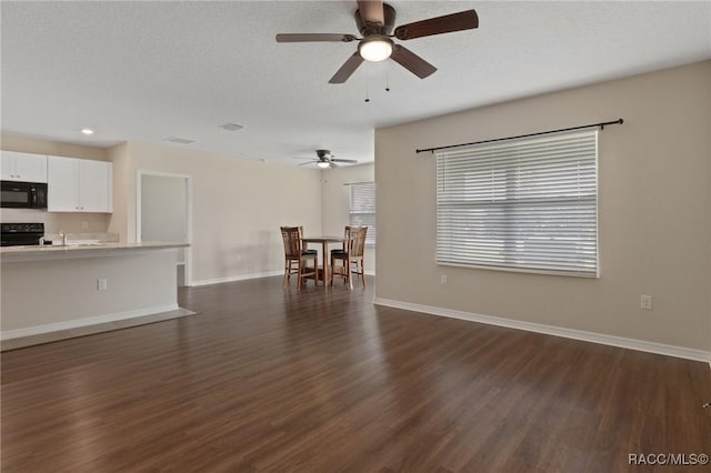 3417 N Michener Pt Unit 2C, Beverly Hills, FL 34465 - living area with a ceiling fan, dark wood-style floors, recessed lighting, and a textured ceiling
