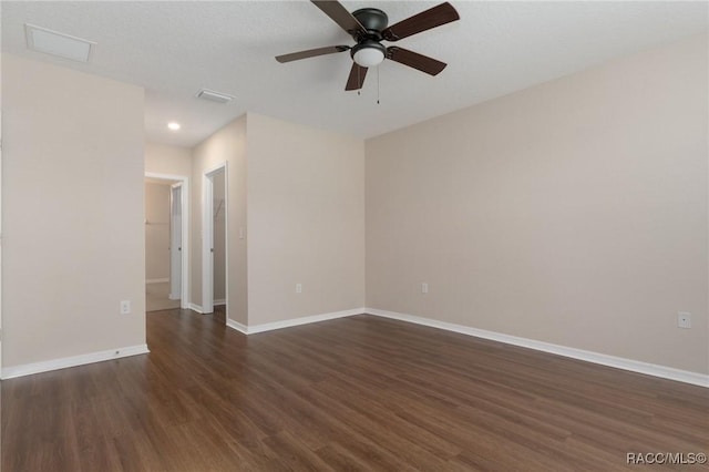 3417 N Michener Pt Unit 2C, Beverly Hills, FL 34465 - spare room featuring dark wood finished floors, a ceiling fan, and recessed lighting
