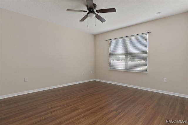 3417 N Michener Pt Unit 2C, Beverly Hills, FL 34465 - unfurnished room featuring dark wood-style floors and ceiling fan