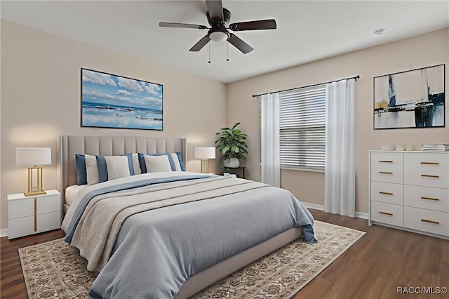 3417 N Michener Pt Unit 2C, Beverly Hills, FL 34465 - bedroom with dark wood-style floors and a ceiling fan