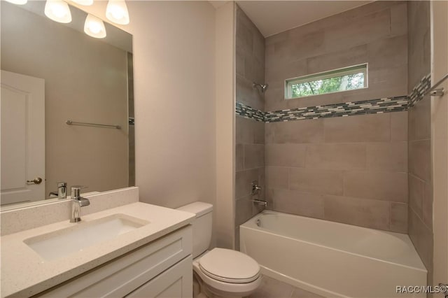 full bath with vanity, toilet, and shower / washtub combination