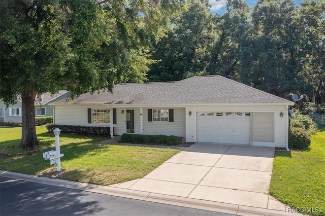 14748 SW 112th Cir, Dunnellon, FL 34432 - ranch-style house featuring an attached garage, driveway, and a front lawn