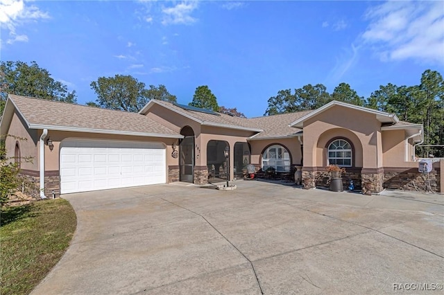 view of front of home featuring a garage