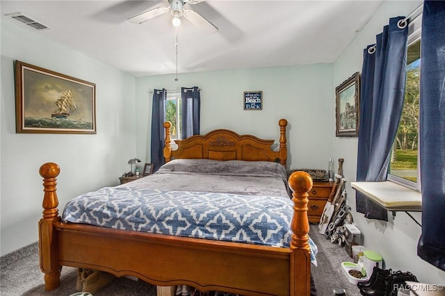 bedroom featuring ceiling fan and carpet flooring