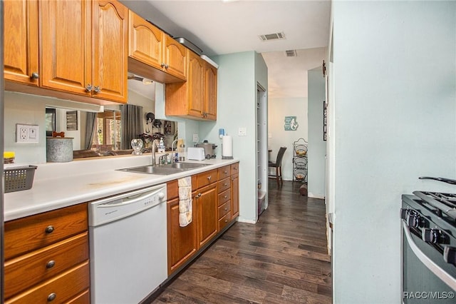 kitchen with dark hardwood / wood-style flooring, sink, range with gas cooktop, and dishwasher