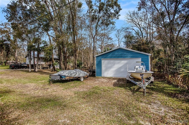 garage with a lawn