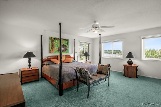 bedroom featuring baseboards, ceiling fan, and carpet flooring