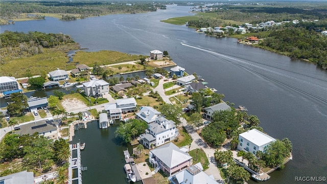aerial view featuring a water view and a residential view