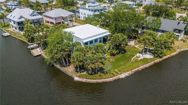 aerial view featuring a water view and a residential view