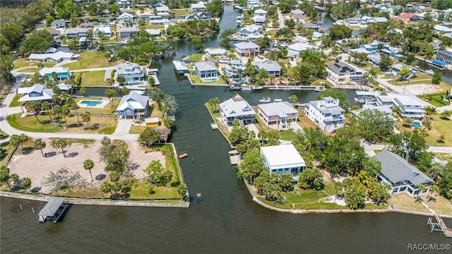 aerial view featuring a water view and a residential view