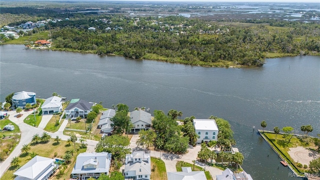 bird's eye view with a residential view and a water view