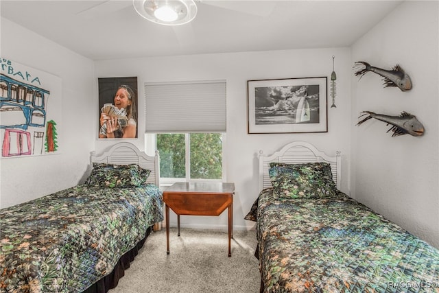 bedroom featuring carpet floors and a ceiling fan