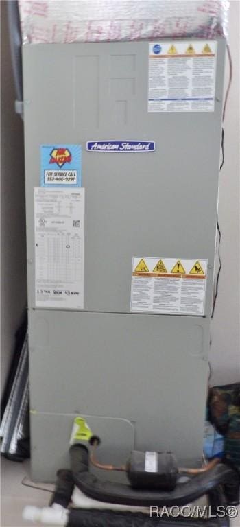 utility room with heating unit