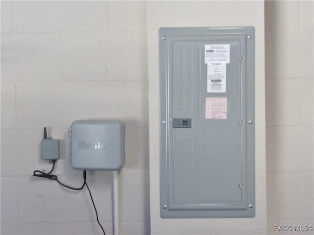 utility room featuring electric panel