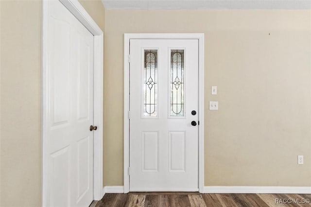 entrance foyer featuring dark wood-type flooring