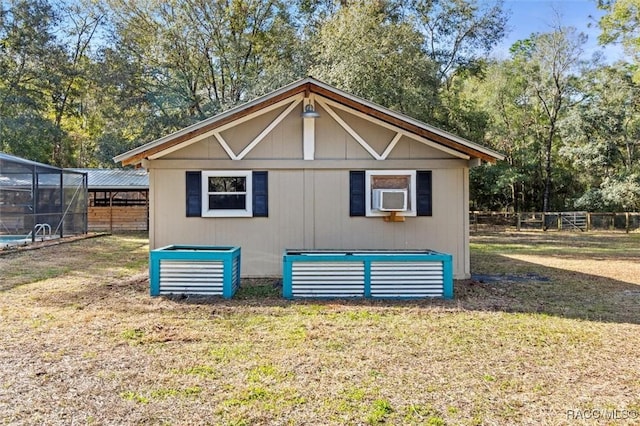 view of property exterior featuring a lawn and a carport