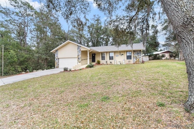 ranch-style home featuring a front yard and a garage