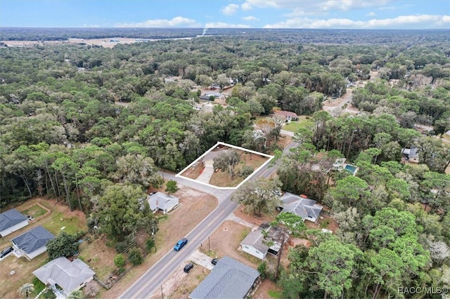 bird's eye view with a view of trees