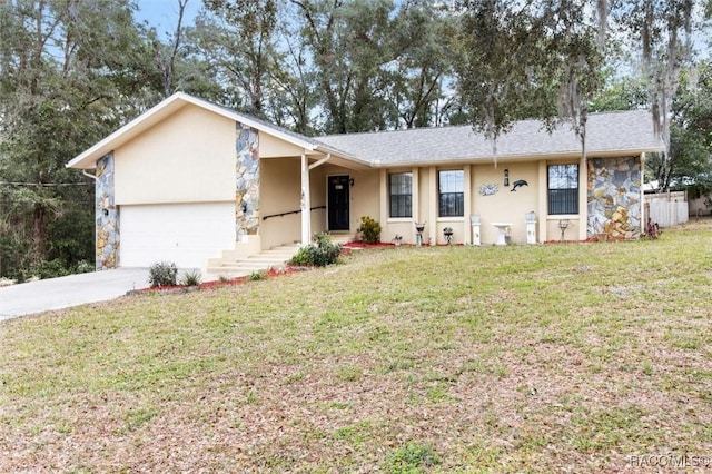 ranch-style house with a front lawn and a garage