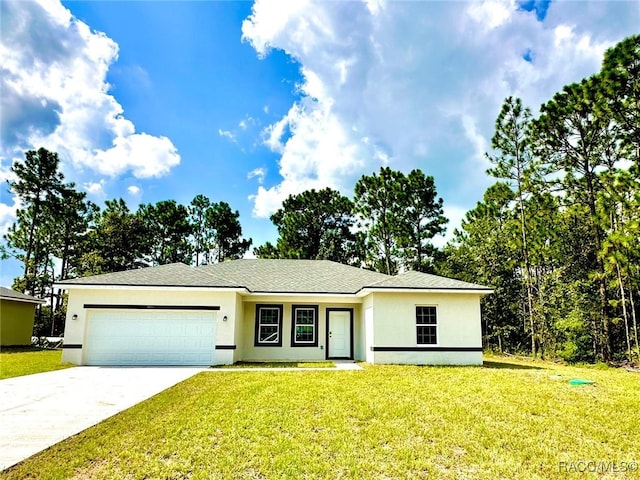 view of front facade featuring a front lawn and a garage