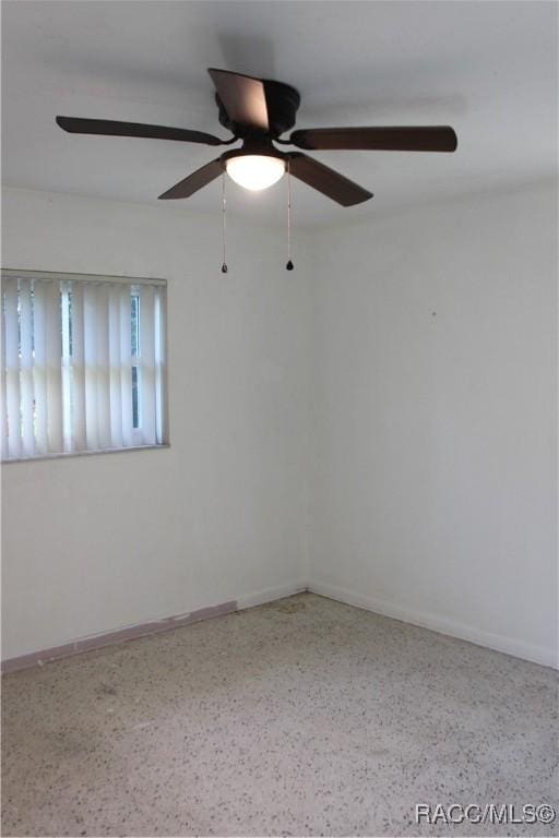 empty room with ceiling fan